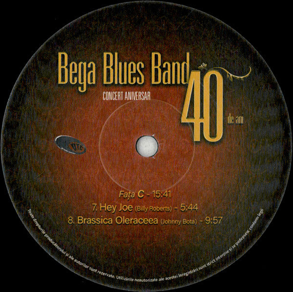 Bega Blues Band - invitați : Alexandra Guțu, Aura Twarowska, Sasha Bota*, Bogy Nagy* împreună cu Orchestra Facultății de Muzică și Teatru din cadrul UVT* dirijată de maestrul Radu Popa – Concert Aniversar - 40 De Ani , 2LP , cu autograf