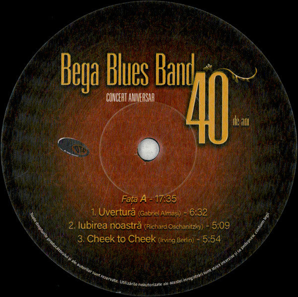 Bega Blues Band - invitați : Alexandra Guțu, Aura Twarowska, Sasha Bota*, Bogy Nagy* împreună cu Orchestra Facultății de Muzică și Teatru din cadrul UVT* dirijată de maestrul Radu Popa – Concert Aniversar - 40 De Ani , 2LP , cu autograf