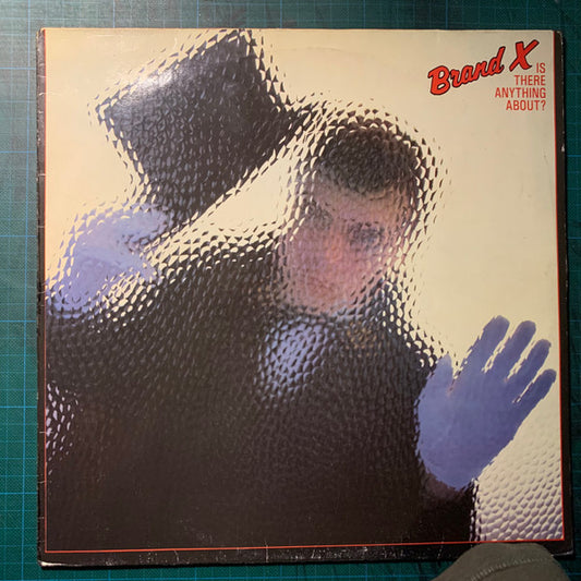 Brand X – Is There Anything About?, Black Labels With Silver Print