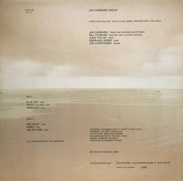 Jan Garbarek Group – Photo With Blue Sky, White Cloud, Wires, Windows And A Red Roof,    1st Press
